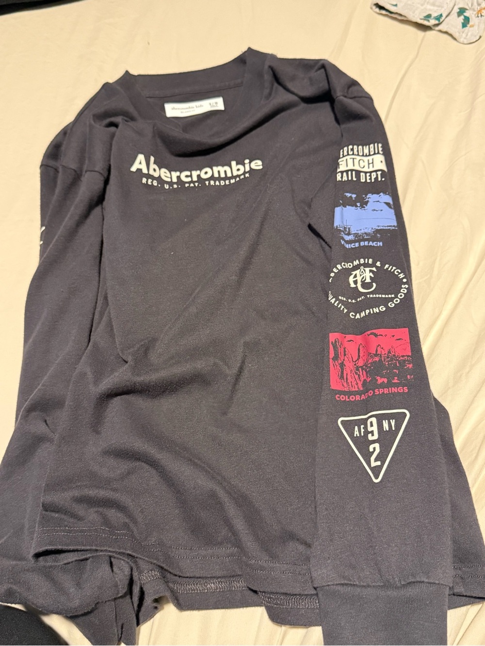 abercrombie kids Black Long Sleeve Graphic Tee with Blue and Red Sleeve Prints